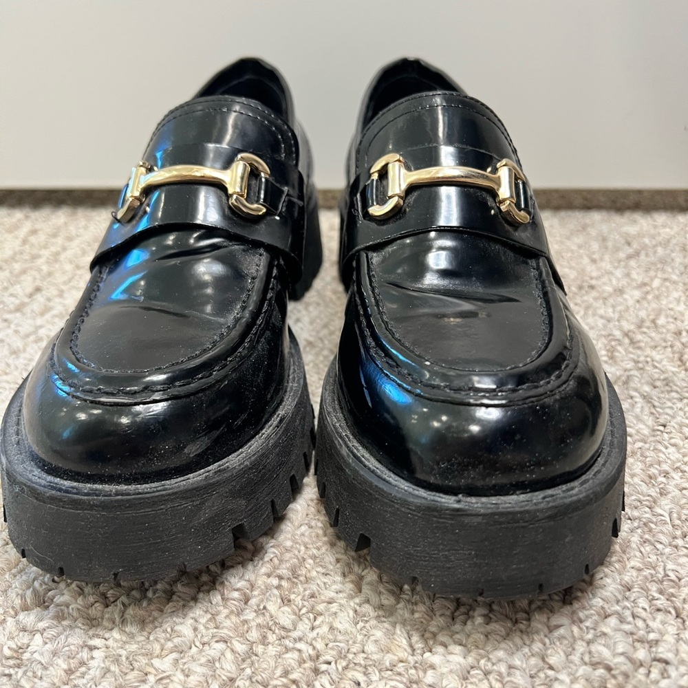 Steve Madden Black Moccasins with Gold Accent